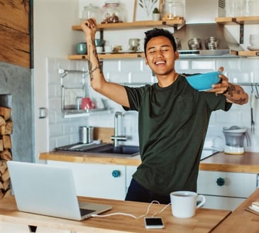 Man Dancing Happily in the Kitchen